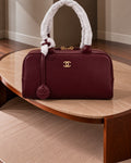CHANEL Smooth Zip Top Handle Charm Bag