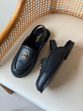 Chanel Shearling-Lined Loafer Mules with CC Logo