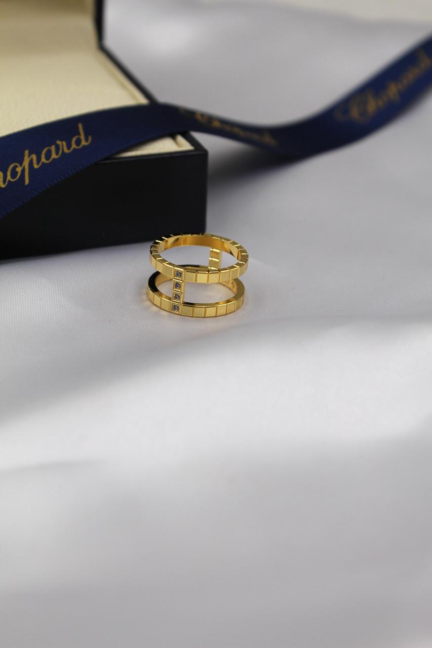 Chopard Ice Cube-Inspired Double-Band Rings — Geometric Square-Pattern Design with Sparkling Stone Accents, Available in Yellow Gold-Tone, Rose Gold-Tone & Silver-Tone Finishes.