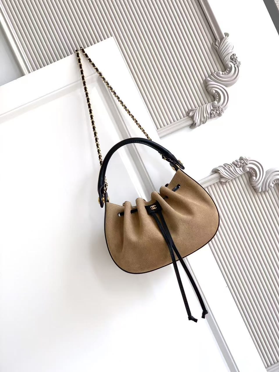 CHANEL Drawstring Top-Handle Chain Bag