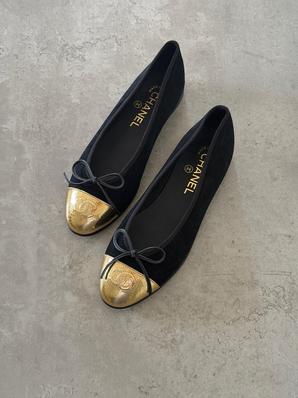 Chanel Black & Gold Cap-Toe Ballet Flats with Bow & CC Logo
