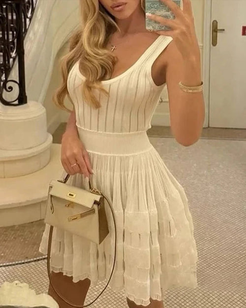 Alaïa White Summer Dress with Pearl Necklace
