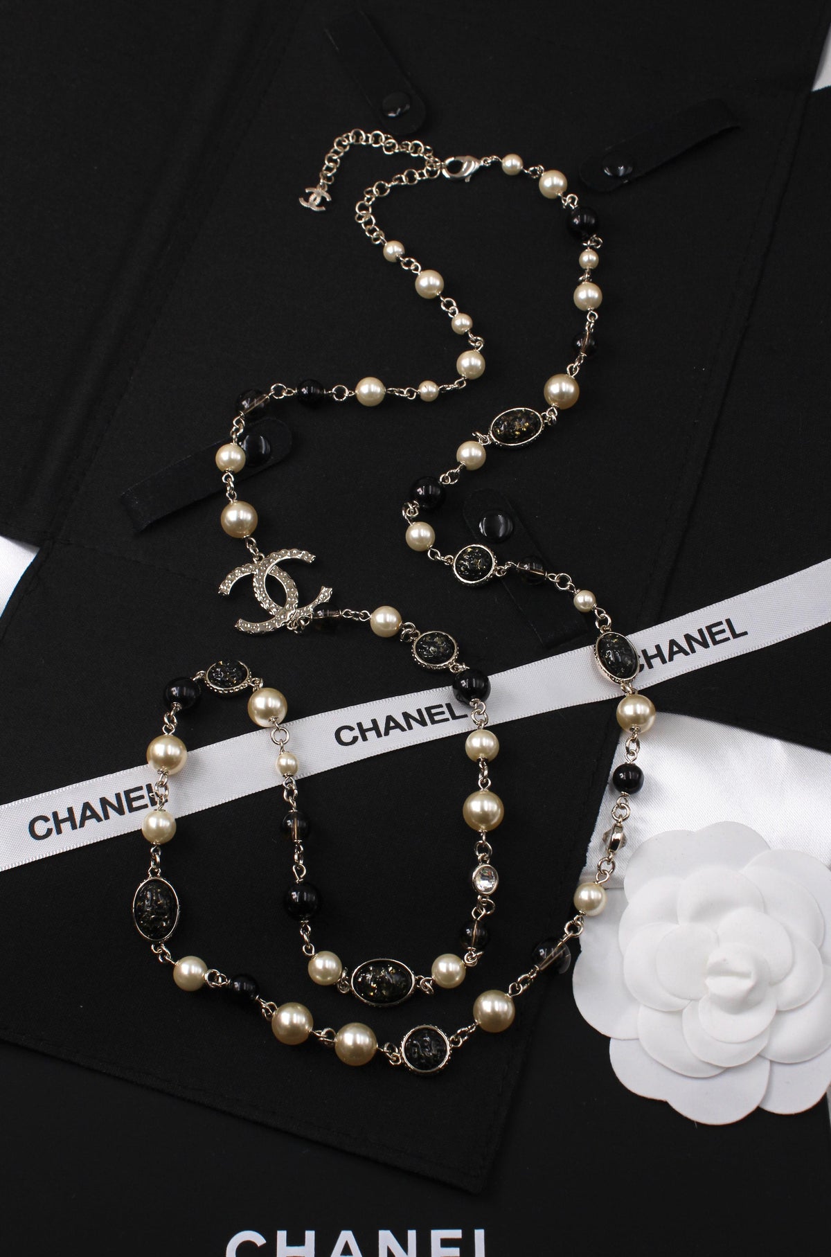 Chanel Long Pearl Necklace with CC Logo