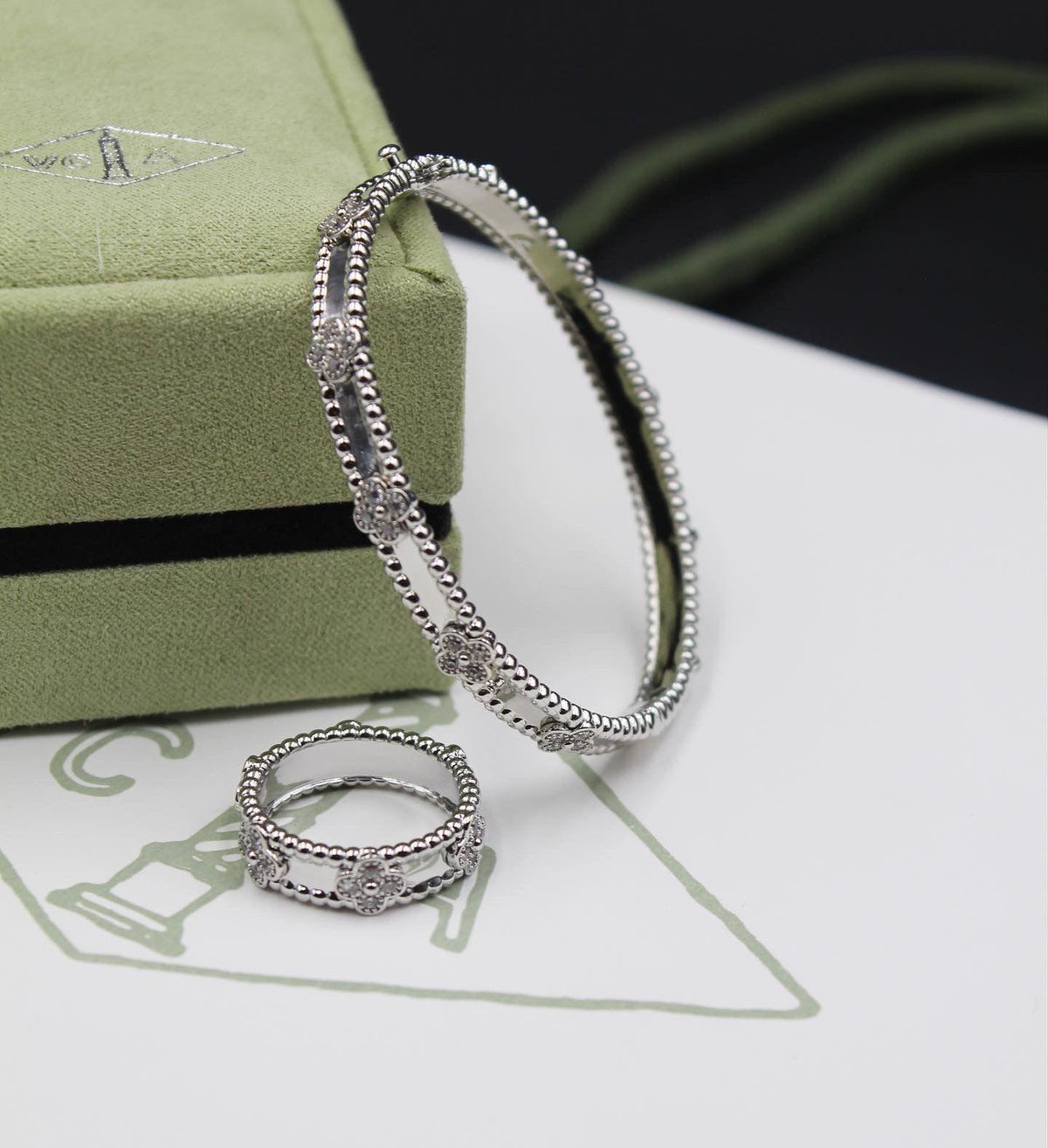 Van Cleef Signature Silver Ring and Bracelet Set