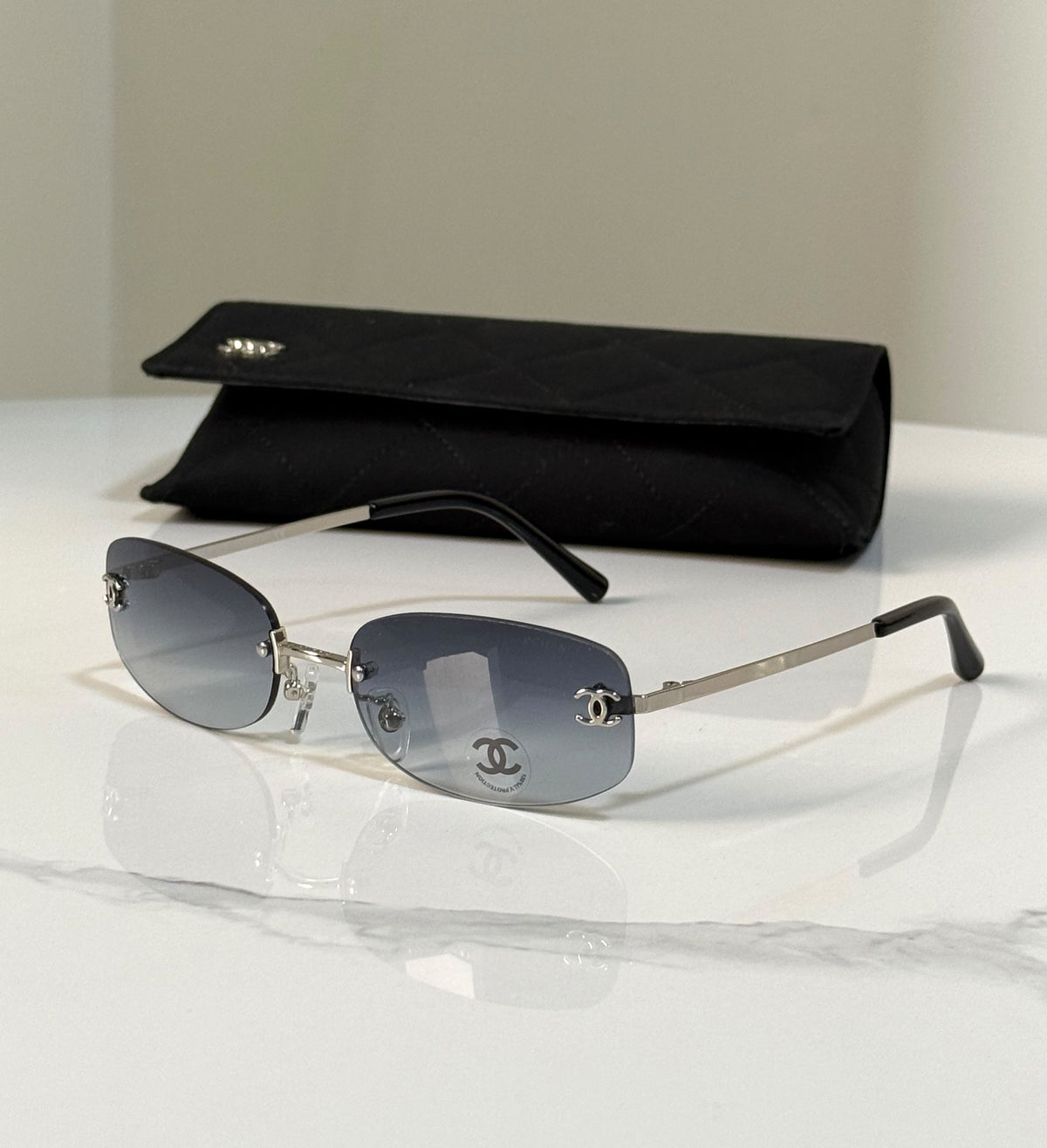 Chanel Rimless Sunglasses with CC Logo