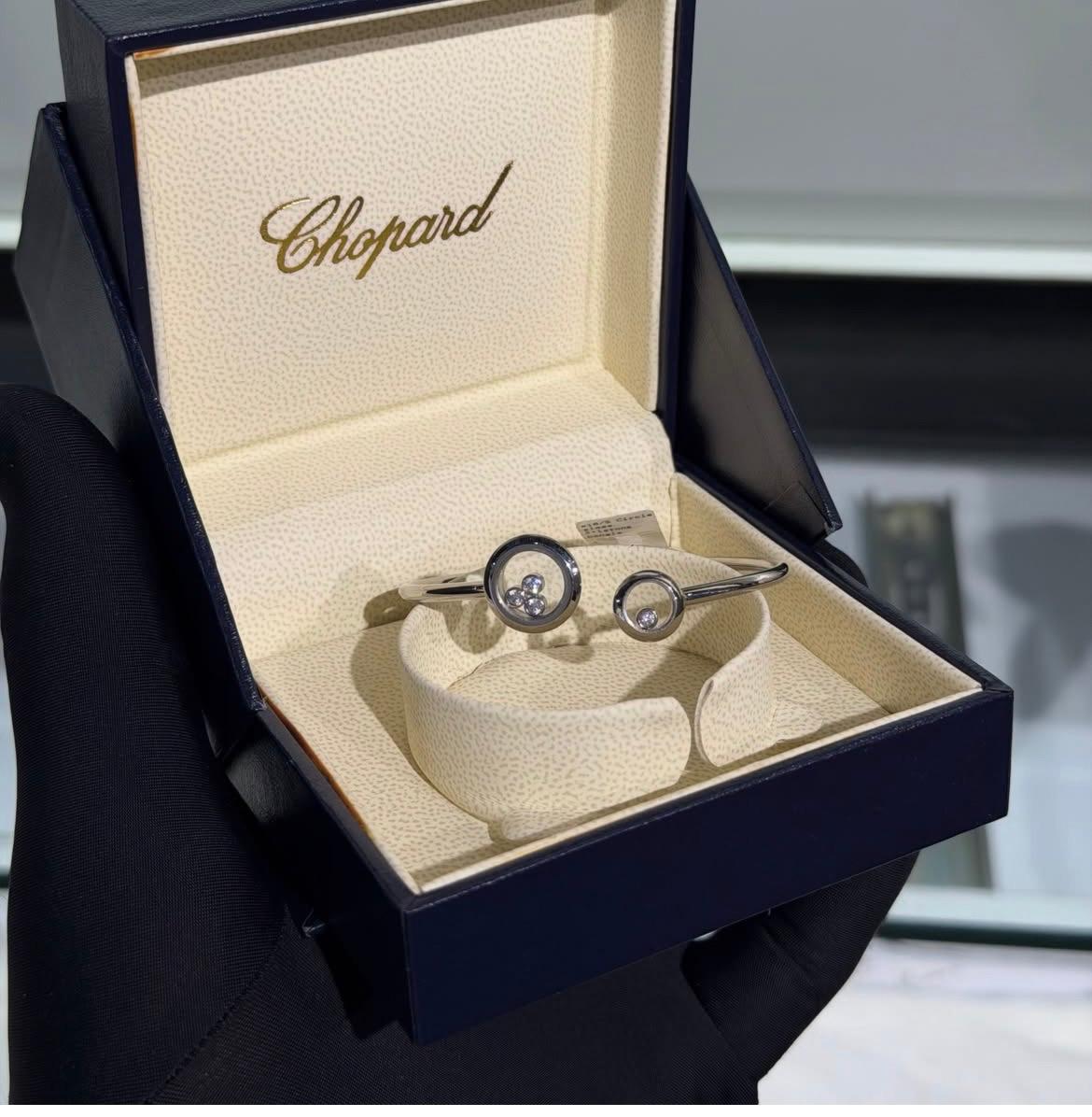 Chopard Happy Diamonds Open Cuff Bracelet — -Tone Metal with Asymmetric Round Motifs and Floating Stone Details.