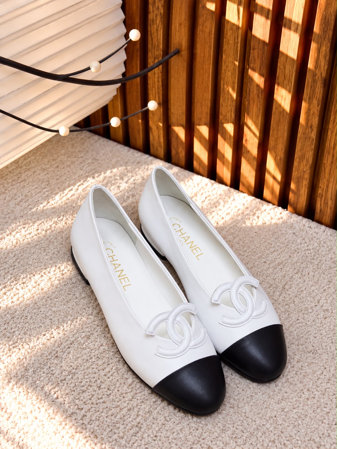 Model: Chanel Two-Tone Leather Ballet Flats with CC Logo