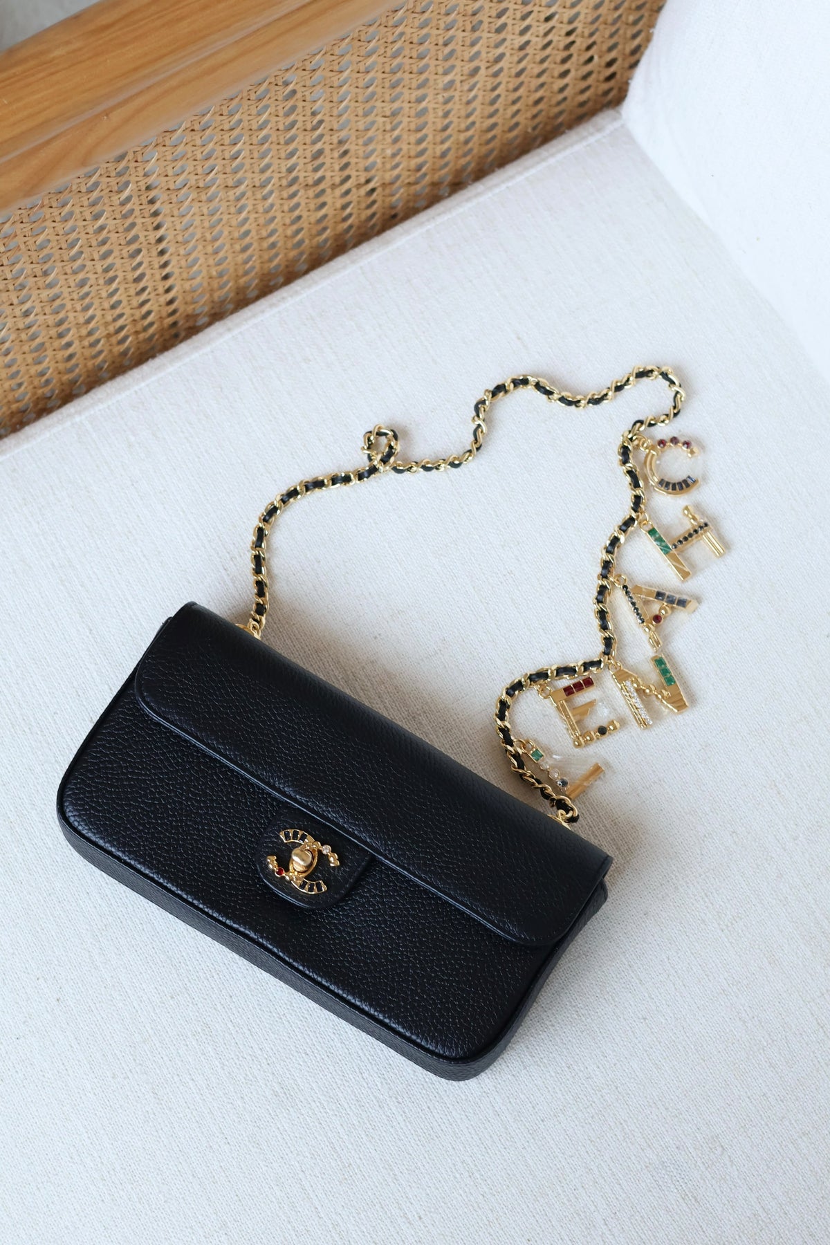 Chanel Black Leather Flap Bag with Gold Chain and Rhinestone Letter