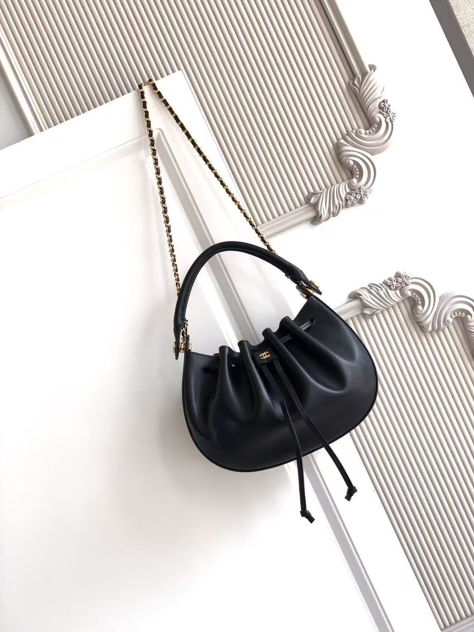 CHANEL Drawstring Top-Handle Chain Bag