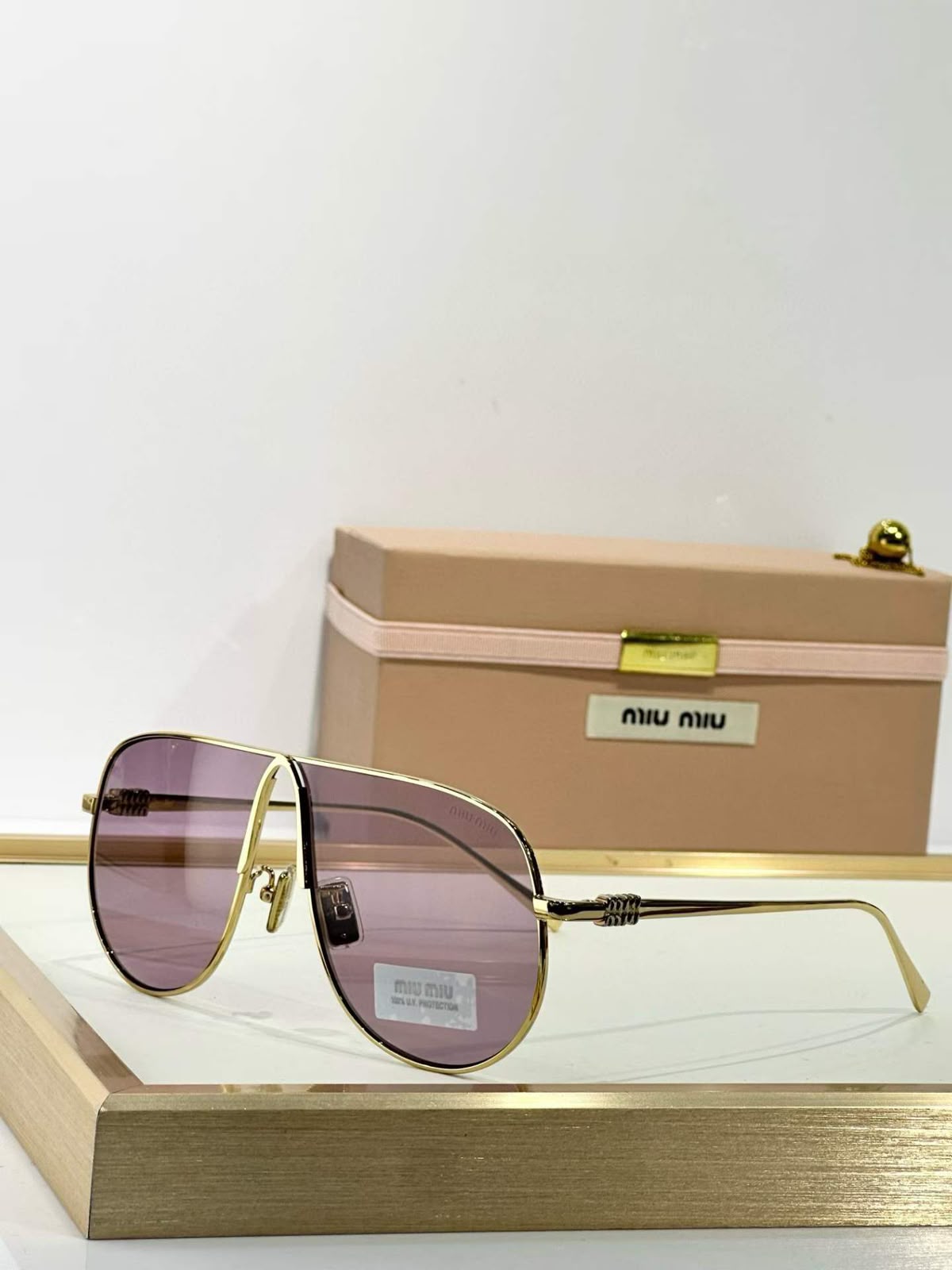 MIUMIU  Sunglasses