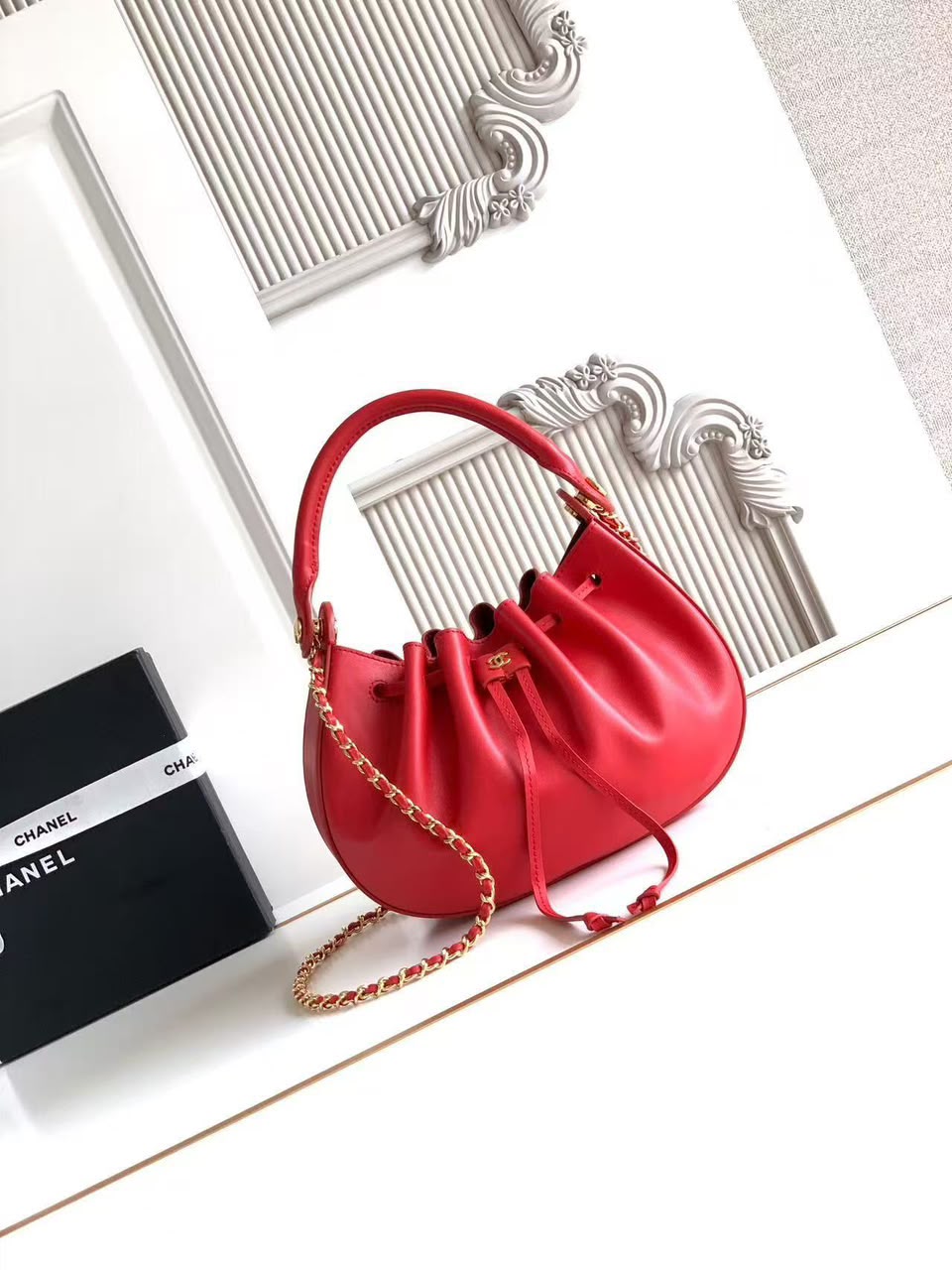 CHANEL Drawstring Top-Handle Chain Bag
