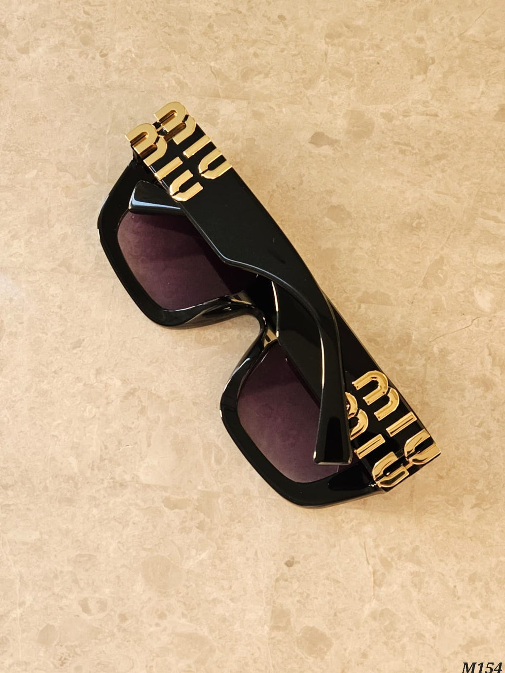 Miu Miu Bold Logo Cat Eye Sunglasses
